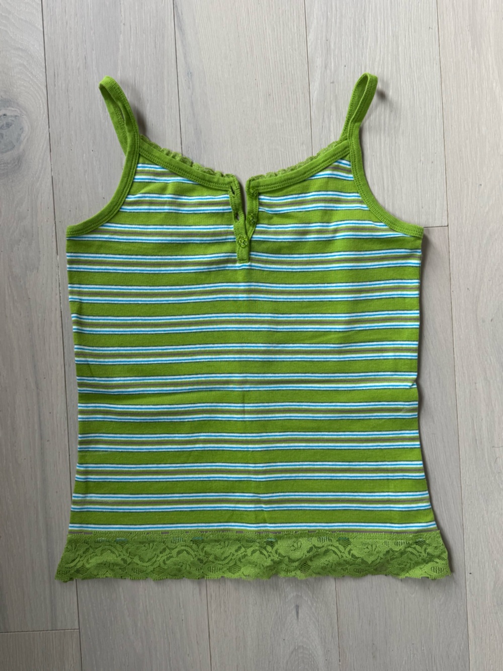 green striped tank top with sparkly buttons